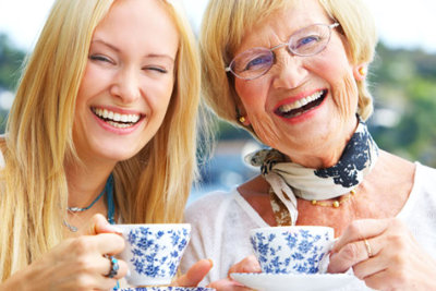 senior woman together with her daughter smiling