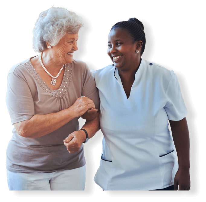 senior woman and nurse smiling each other